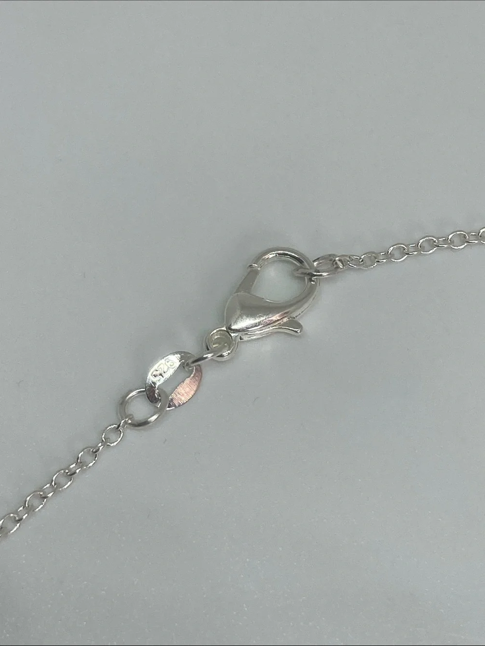 Silver necklace with amethyst, sodalite and aquamarine stone charms